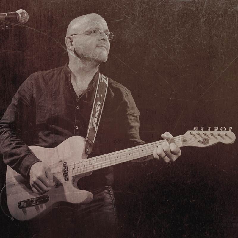 Guitarist playing a Telecaster