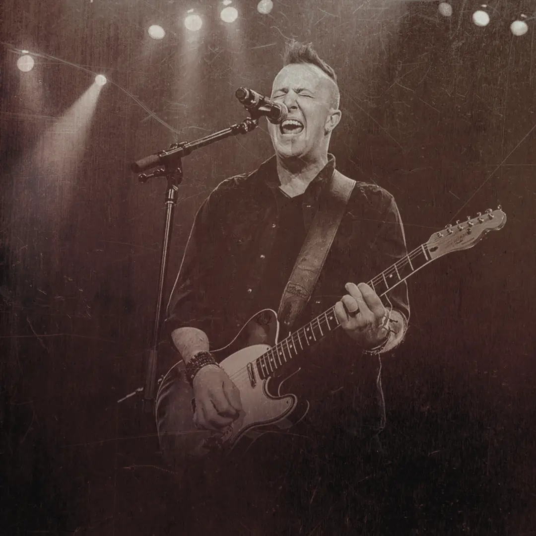 Guitarist singing with a Telecaster