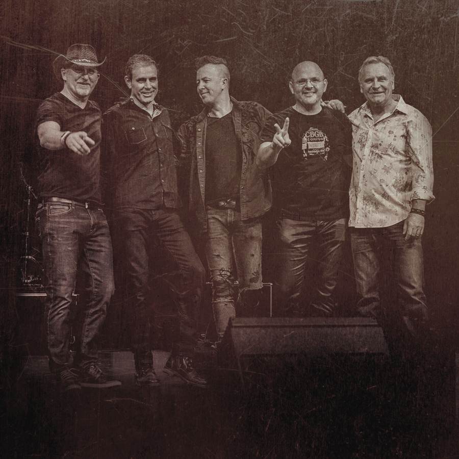 Renegade band promo photo, five members on stage