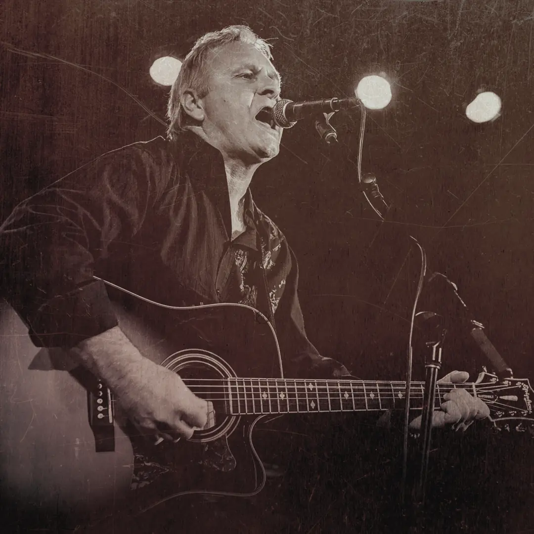 Singer with acoustic guitar